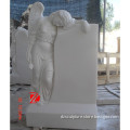 white carved grave stone angel statue